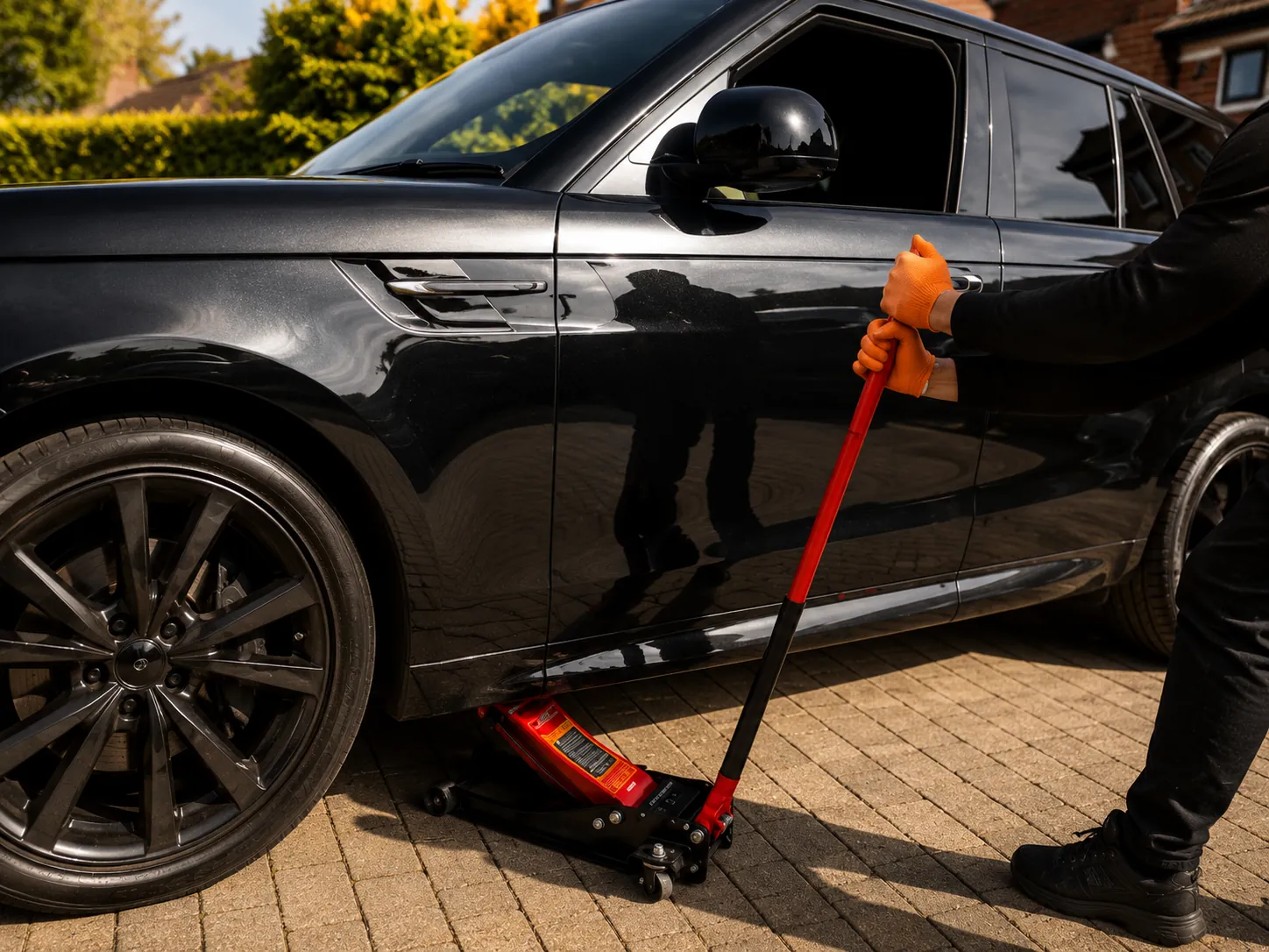 Range Rover receiving specialized mobile tyre fitting